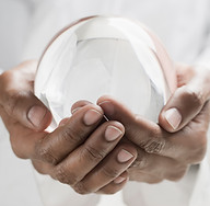 Hands Holding Crystal