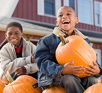 Kids With Pumpkins