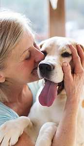 Woman Hugging Dog