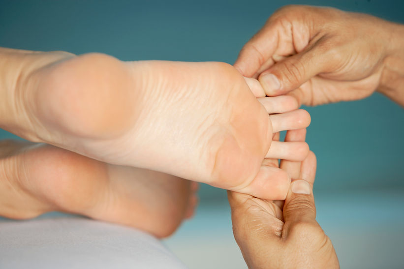 Close-up of a woman getting a relaxing foot massage for athlete's foot care