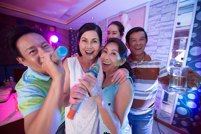 Asian family karaoke night