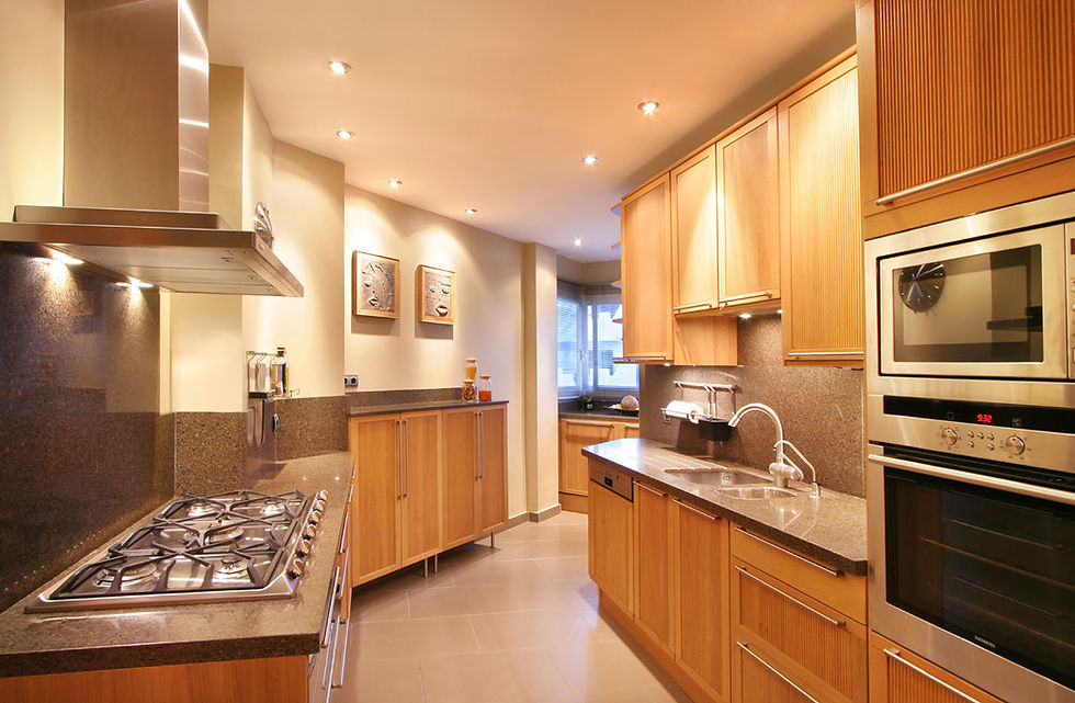 Kitchen improvement with wooden cabinets and granite worktops