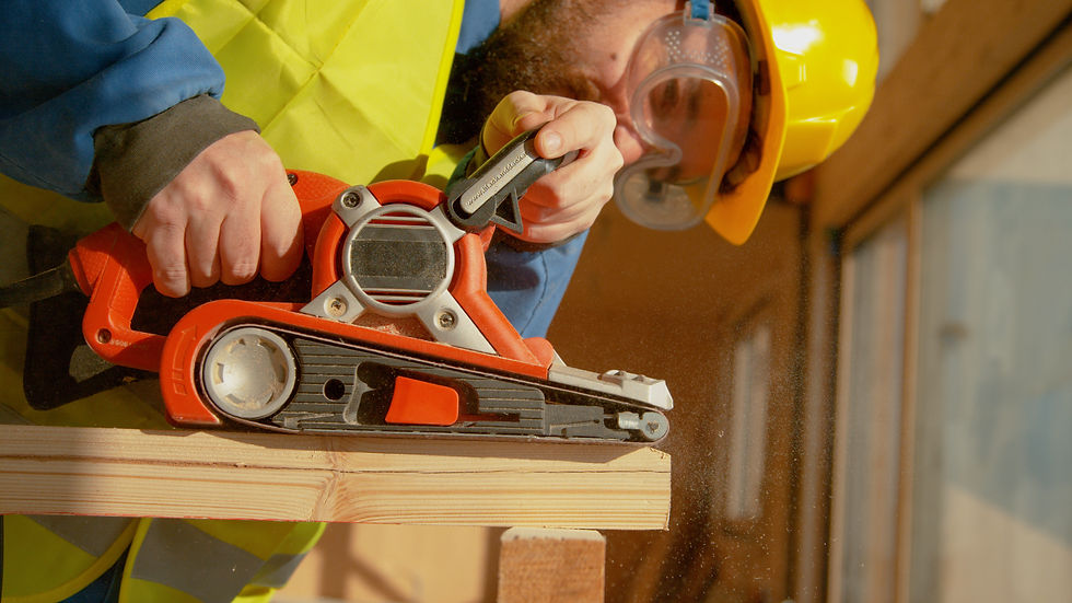 Carpenter Using Sander