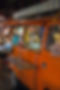 Orange van in a garage