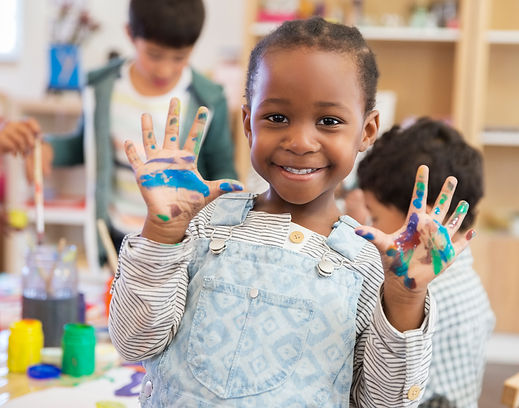 Student with messy hands in classroom