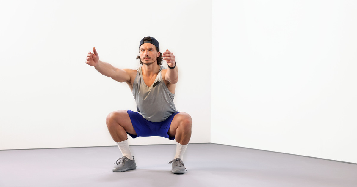 A person performing a whole-body movement while different muscle groups work together to support balance, strength and coordinated movement.