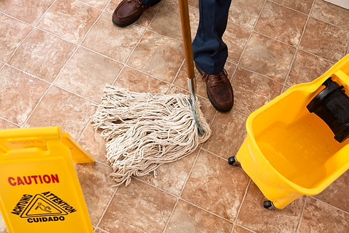 A professional mopping floor of a retail outlet store