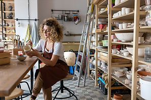 Woman in Pottery Studio