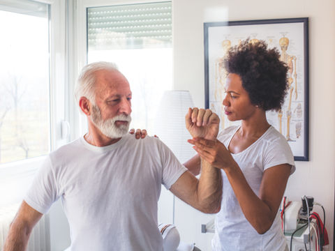 A man getting a massage at home