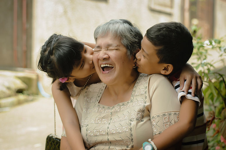 Grandchildren Kisses Grandmother