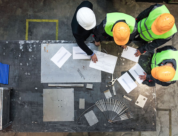 Construction crew looking over plans