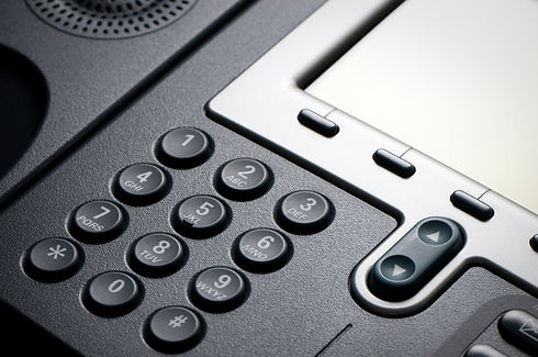 Close-up of a digital VoIP conference phone