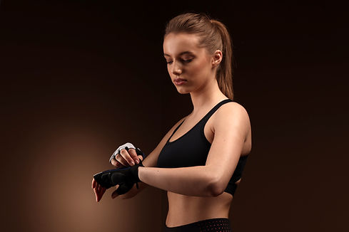 Woman with Workout Gloves