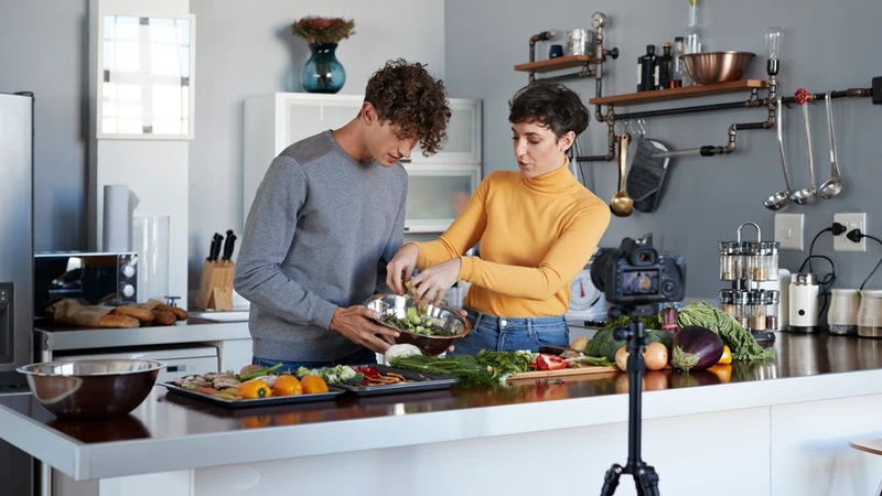 couple cooking in kitchen