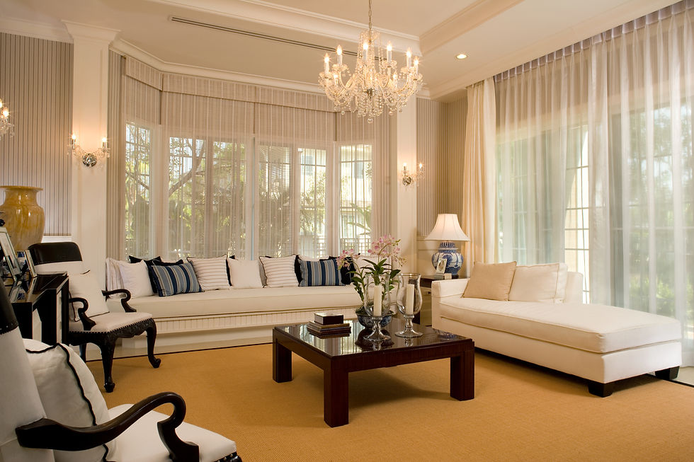 A bright modern residential lounge interior featuring white sofas and a dark wood coffee table over newly installed carpets under a translucent dark overlay