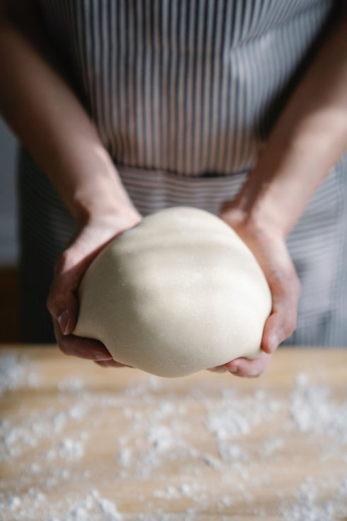 Hands Holding Dough