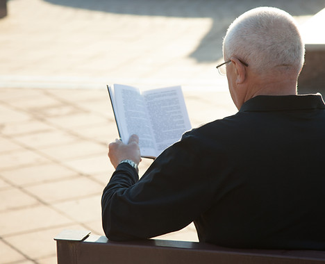 Man Reading Outdoors