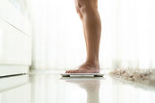 Person on weighing scale
