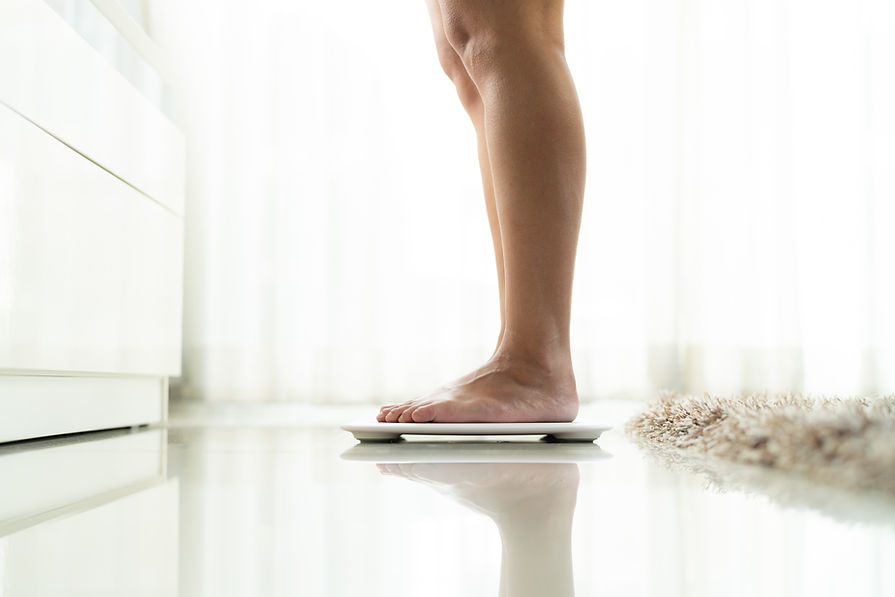 Person on weighing scale