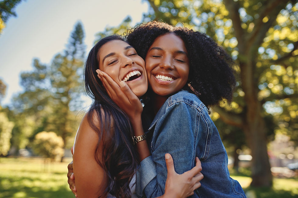 Friends Embracing Outdoors