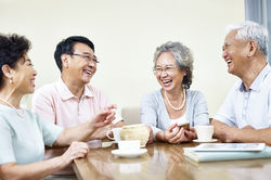 Elderly People Chatting Together