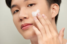 Applying Face Moisturizer