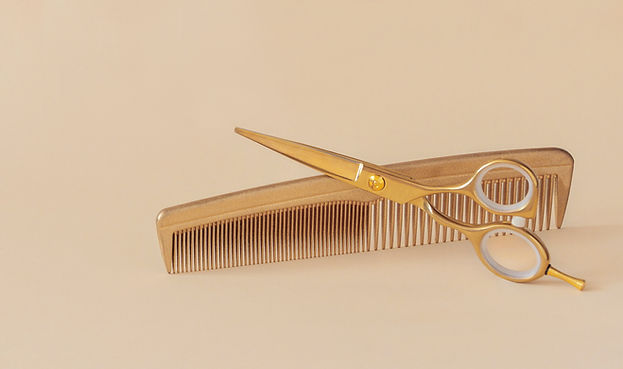 Gouden kam en schaar