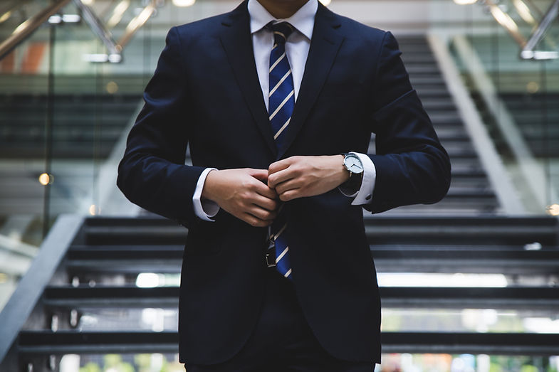 Man Adjusting Suit