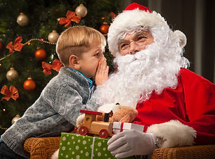 Child Whispering Santa