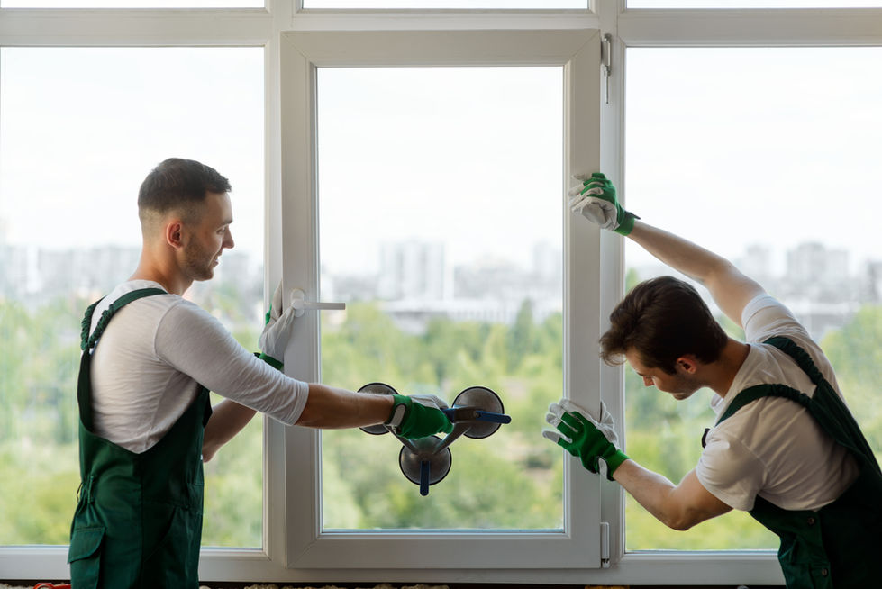 Workers Installing Window