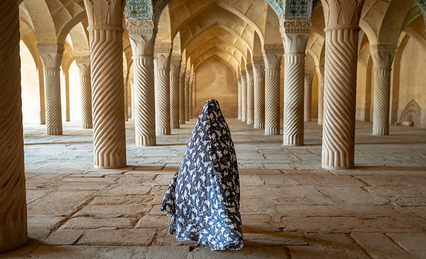 Person in Archways