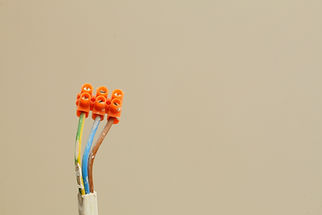 Electrical installation electric socket wires with terminal blocks hanging on wall