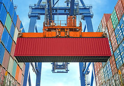 A Crane Lifting a Container