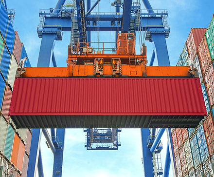 A Crane Lifting a Container