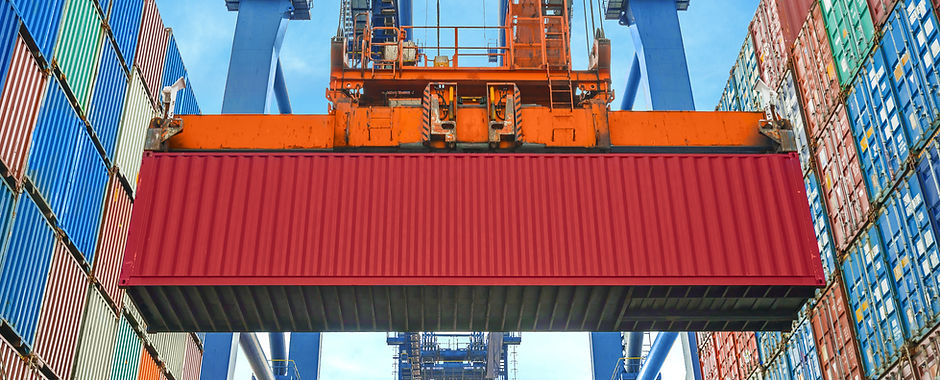 A Crane Lifting a Container