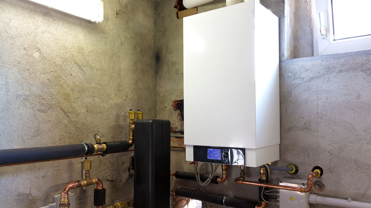 A new gas boiler installed in the boiler room