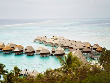 Overwater villas in Bora Bora, French Polynesia, one of the world's premier luxury beach destinations.