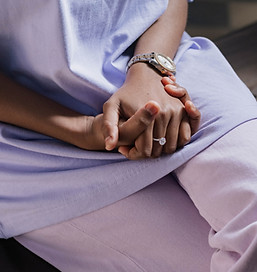 Seated with Hands Held