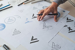 Graphic designer revising a logo