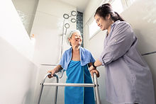 Caregiver assisting with a shower