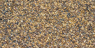 Light gold coloured angular gravel driveway installation
