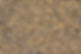 Small beige and brown rounded gravel stones in a soft focus texture