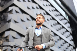 Person holding a bike