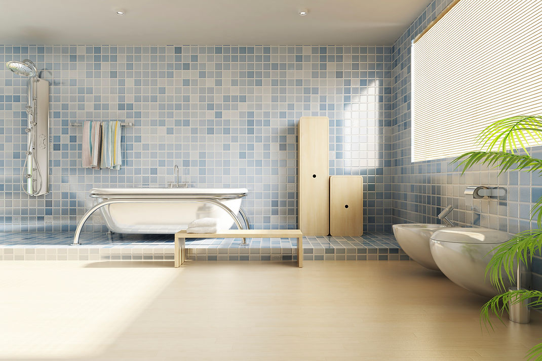 Modern bathroom with a sleek freestanding tub on blue tiles