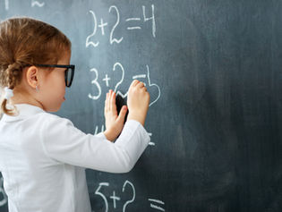 A child doing a math calculation
