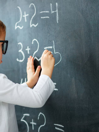 A child doing a math calculation