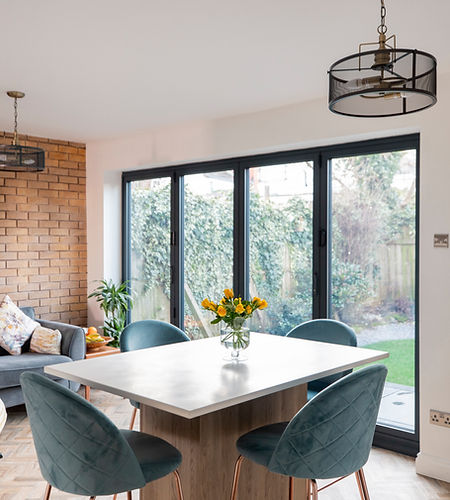 Home interior with open plan kitchen, lounge and dining area