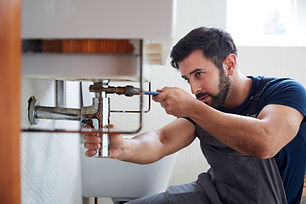 Plumber Fixing Pipe