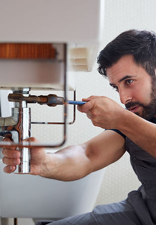 Plumber Fixing Pipe