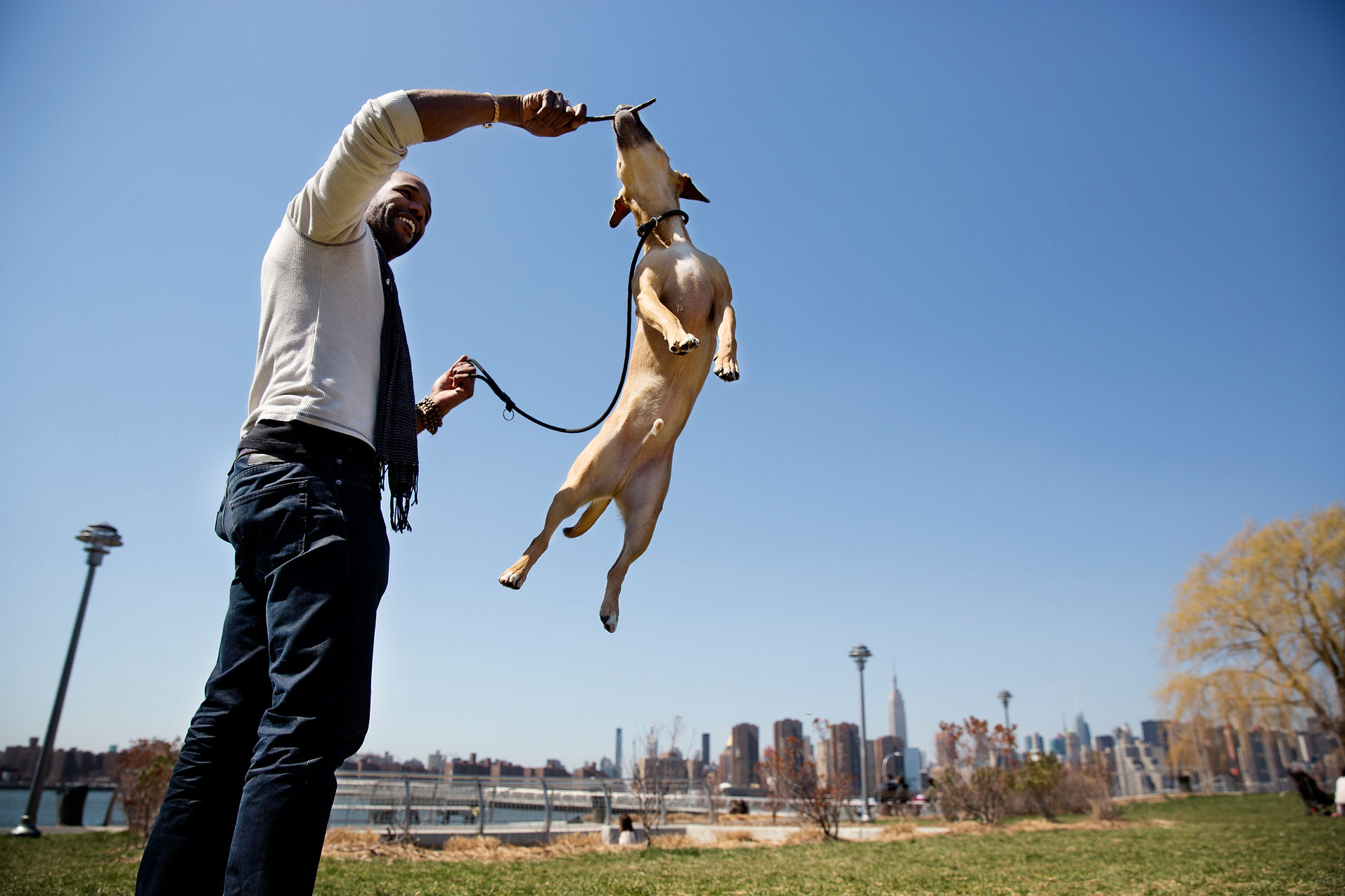 Man Playing with Dog